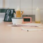 white ceramic cup on white ceramic saucer